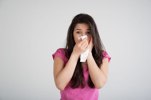 allergies, the common cold, flu-woman sneezes.
