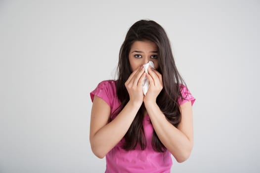 allergies, the common cold, flu-woman sneezes.