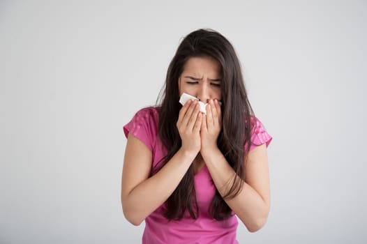 allergies, the common cold, flu-woman sneezes.