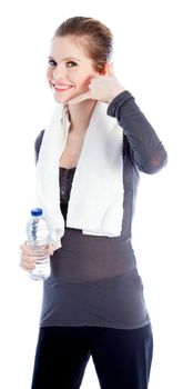 Attractive caucasian woman wearing a sport outfit in her 30 isolated on a white background