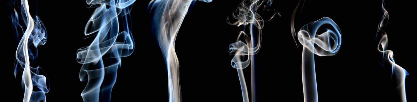 Blue and White smoke collection on black background