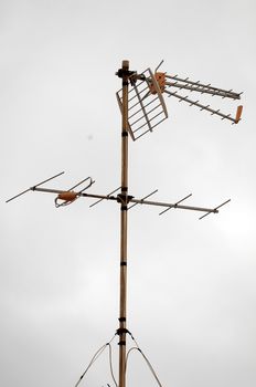 Antennas on a Roof over a Cloudy Sky, in Canary Islands, Spain