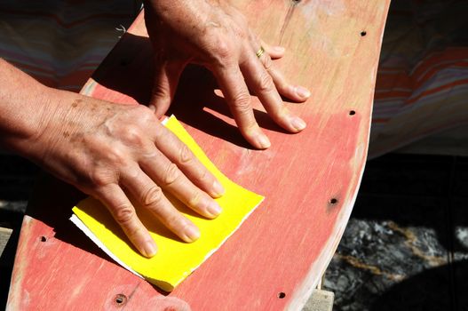 Restore an Old Skateboard with a Yellow Sandpaper