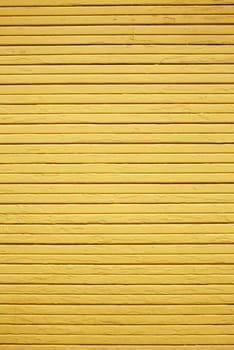 Weather Yellow wood wall vertical composition with horizontal planks