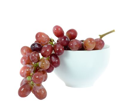 red grapes  in white bowl on  white