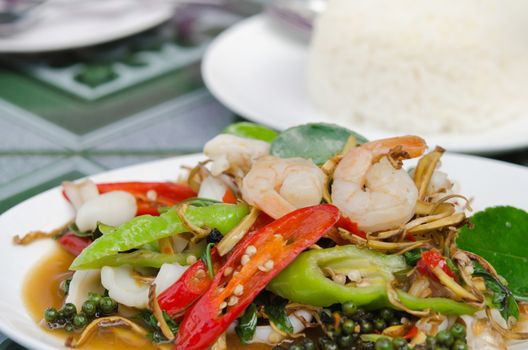 Fried herbal vegetables with mix seafood , spicy food