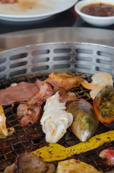 grilled pork, chicken  and mix seafood , bbq cooking