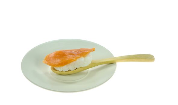 salmon sushi with wooden spoon on  plate on white background
