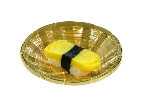 Tamago yaki is sushi using an egg, like a sushi omelette in basket 
