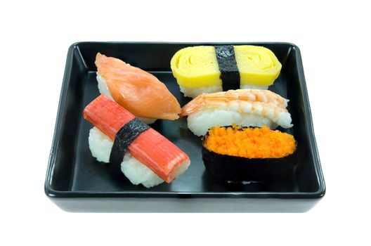 Japanese seafood sushi set , mix sushi rolls on black plate