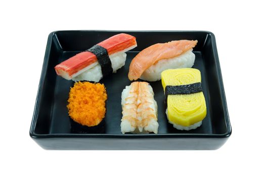 close up Japanese seafood sushi set , mix sushi rolls on black plate