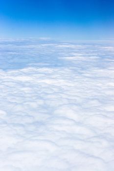 Bright blue sky with white clouds