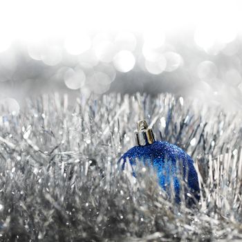 blue christmas ball on silver background