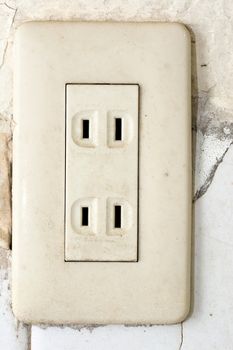 Old socket, electrical outlet. Close-up