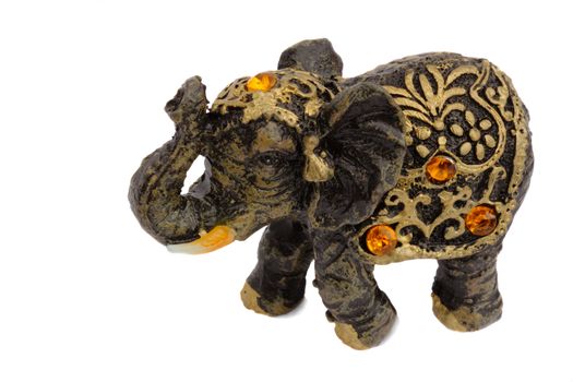 Cute souvenir - a figurine of a baby elephant, decorated with amber.