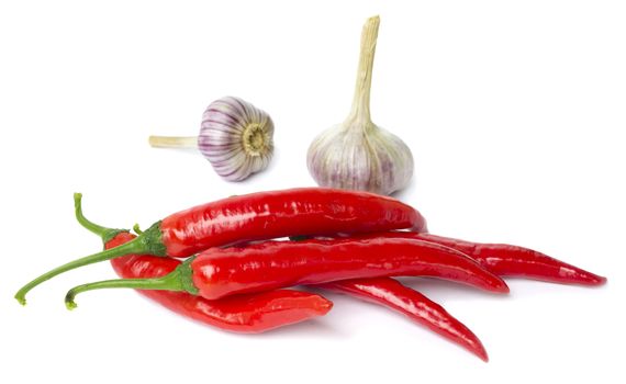 Red pepper and garlic on white background 