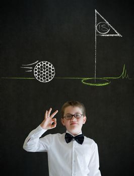 All ok or okay sign boy dressed up as business man with chalk golf ball flag green on blackboard background