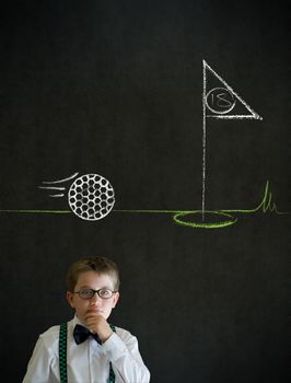 Thinking boy dressed up as business man with chalk golf ball flag green on blackboard background