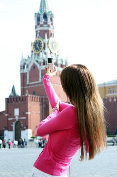 Young woman photographed attractions in Moscow