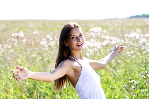 Charming girl in the field