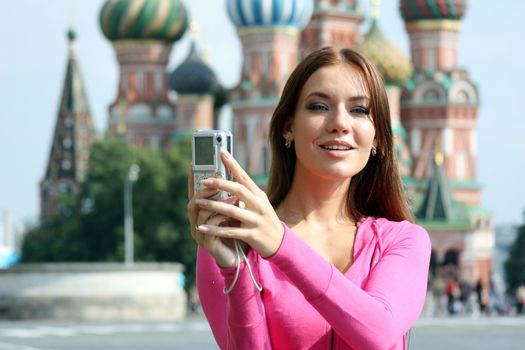 Young woman photographed attractions in Moscow