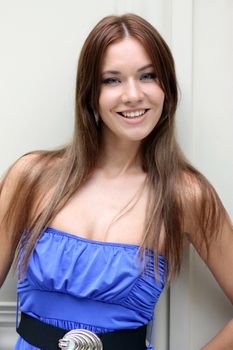 Happy sexy woman in blue dress