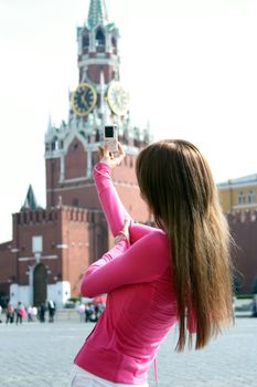 Young woman photographed attractions in Moscow