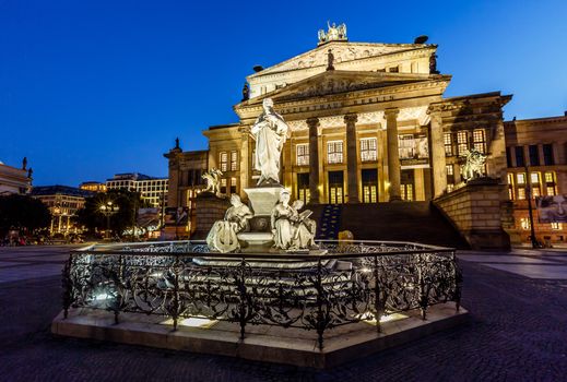 Friedrich Schiller Sculpture and Concert Hall on Gendarmenmarkt Square at Night, Berlin, Germany