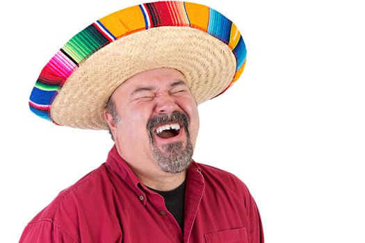 Happy guy with sombrero hat laughing out loud with his eyes closed