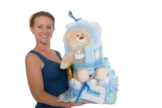Isolated on a white background, a pretty lady holding baby diaper cake present with different items for the expectant family and their boy
