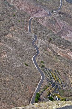 Road in the desrt from a mountain in Lanzarote Spain