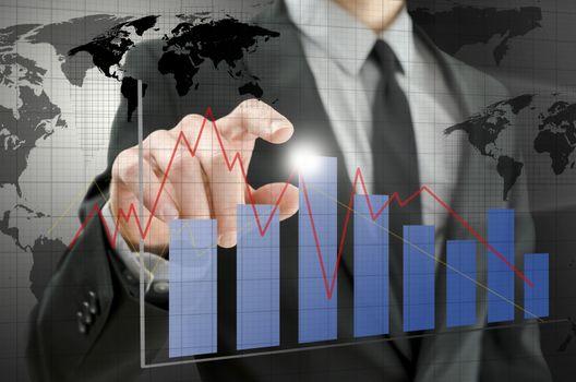 Detail of business man pointing at interactive business graph. 