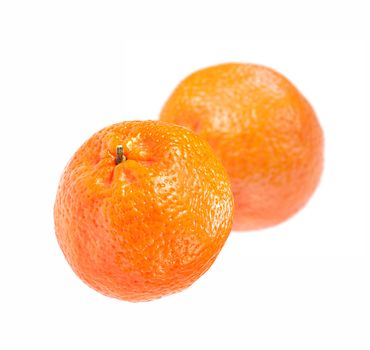 Two tangerine isolated on white