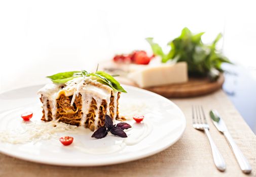 Closeup of lasagna and basil