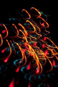 Abstract  Christmas light background. Intentional motion blur  