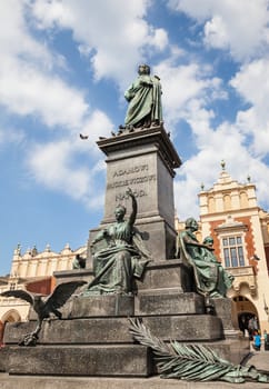 Statue of Adam Mickiewicz, famous Polish poet, on the central market square in Krakow, Poland.