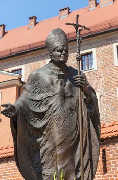 Statue of Pope John Paul II ( Blessed John Paul or John Paul the Great, Papa Giovanni Paolo II, Karol Jozef Wojtyla ) on Wawel in Krakow, Malopolska, Poland, Europe