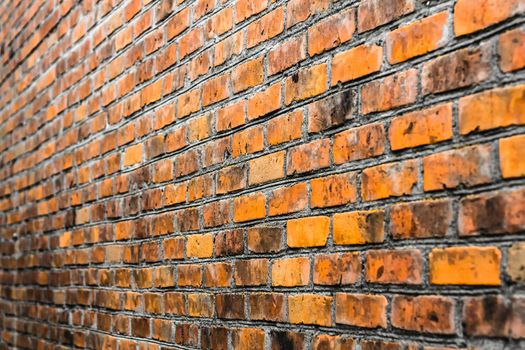 Perspective Of A Dirty Red Brick Wall. Selective Focus