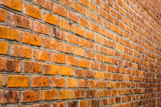 Perspective Of A Dirty Red Brick Wall. Selective Focus