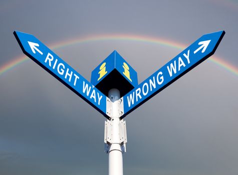 Wrong Way and Right Way Traffic Sign On Rainbow Background