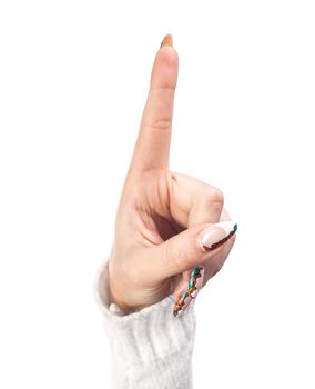 Hand with index finger raised up on a white background