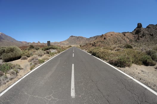 Empty road in the desert to infinity,in Tenerife, Spain