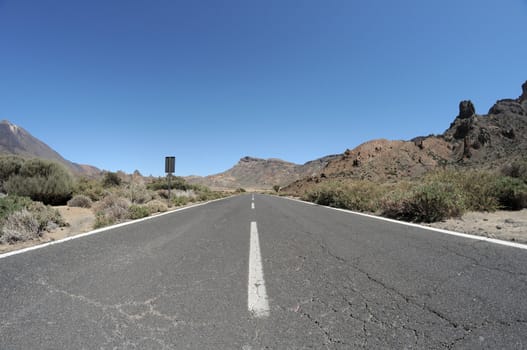 Empty road in the desert to infinity,in Tenerife, Spain
