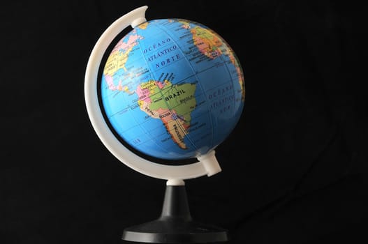 Globe on a black bacground showing south america