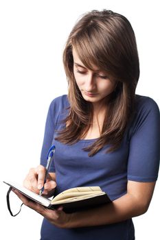 student with a pen and a notebook on a white background