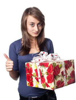 happy young woman holding a gift box