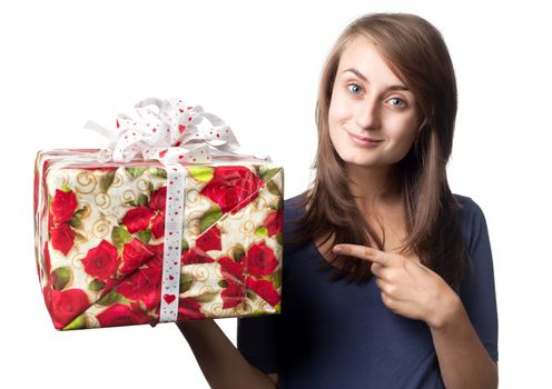 happy young woman holding a gift box