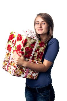 happy young woman holding a gift box