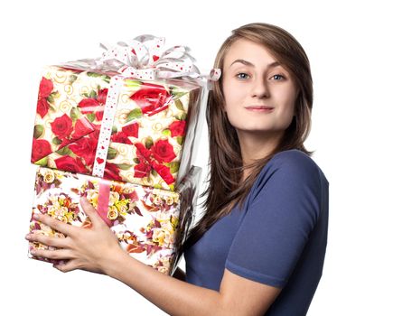 happy young woman holding a gift box