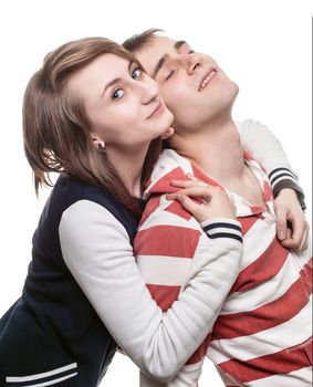 Portrait of a girl with a young man isolated on white. Focus on girl